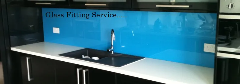 Image of blue glass backsplash in kitchen