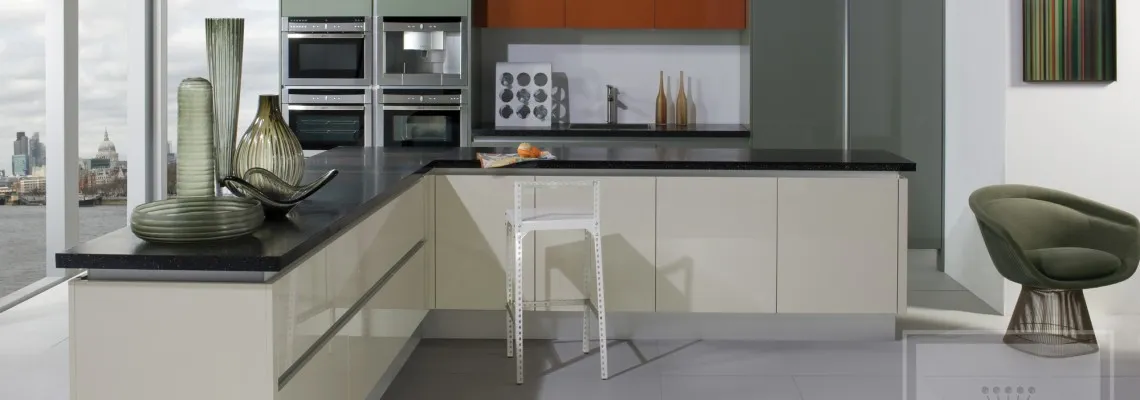 Cream Gloss Handleless Kitchen Interior image of kitchen with cream gloss cabinetry