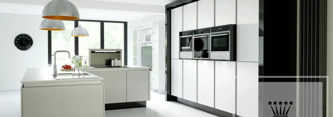 Image of modern kitchen with white island and cabinets and black contrast